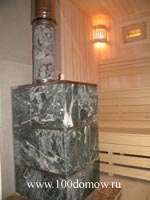 Установка печки, отделанной талькохлоритом